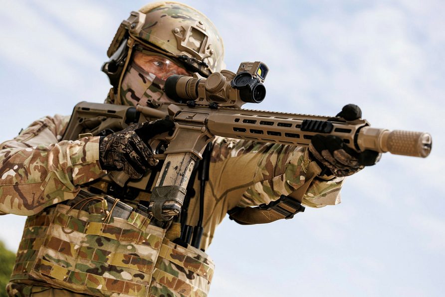 The Bayonet is Obsolete: The case for change in extremely close quarters combat 1
UK MOD © Crown copyright 2023
£90 million contract equips Armed Forces with advanced new rifle A soldier from the Ranger Regiment poses with the new Alternative Individual Weapons (AIW) system at Lulworth Training area. The Hunter contract is worth £90M and will have provision to procure up to a maximum of 10,000 Alternative Individual Weapons (AIW) systems. An AIW system consists of: • Rifle with Signature Reduction System (SRS), • Magnified optic sight and Mini Red Dot (MRD) sight, • Training solution – Safe Blank Firing System & Marker Round Training System. • New rifle provides UK troops with an improved lethal capability on the battlefield. • Rifle more discreet through sight and hearing signature reduction. •